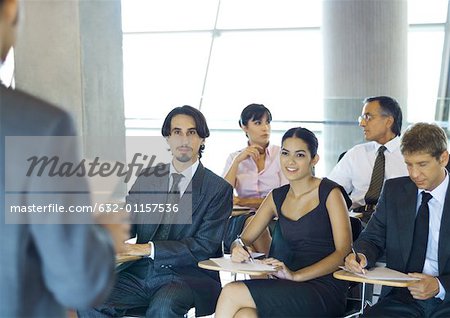 Executives sitting in seminar