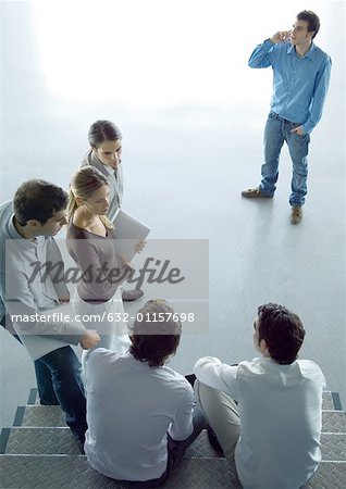 Informal business meeting, high angle view