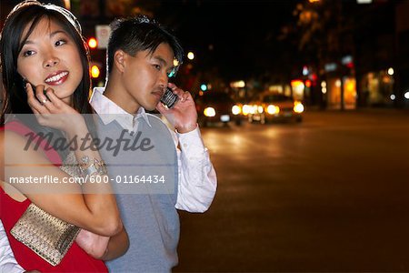 Couple on Date with Cellular Phones