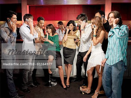 People in Night Club, Talking on Cellular Phones