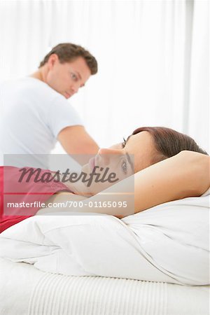 Couple Upset in Bed