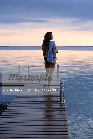 Woman on Dock by Water