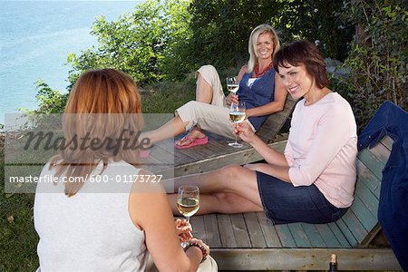 Women Drinking Wine Outdoors