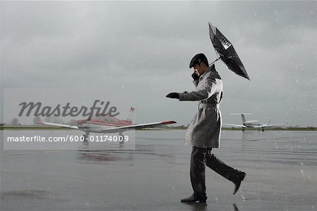 Man Caught in Storm on Airport Tarmac