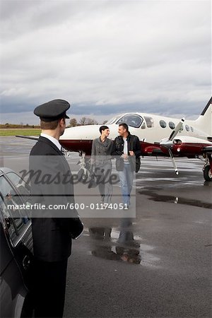 Chauffeur Waiting for Passengers at Airport