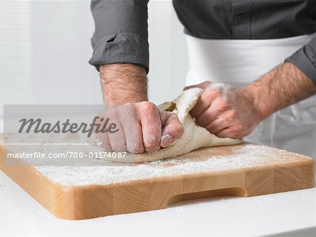 Man Kneading Dough
