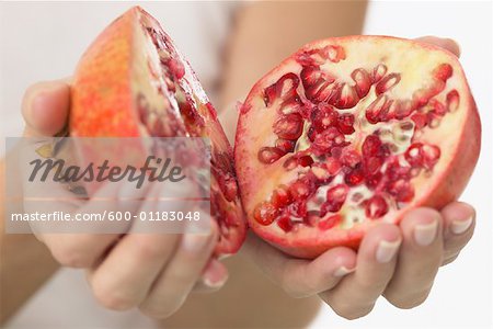 Woman Holding Pomegranate