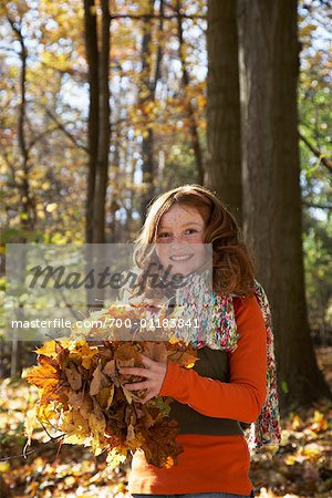 Portrait of Girl Holding Leaves