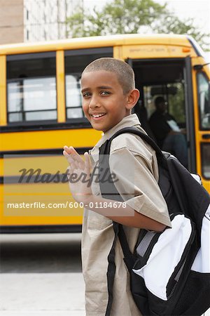 Boy Leaving on School Bus