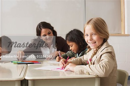 Students and Teacher Drawing in Classroom