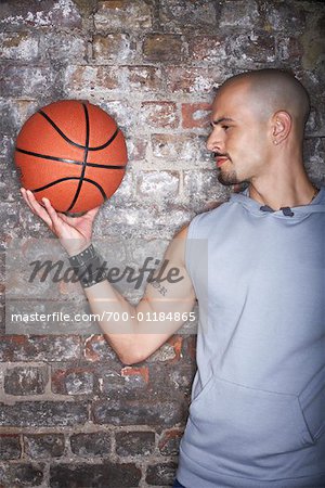 Man Holding Basketball