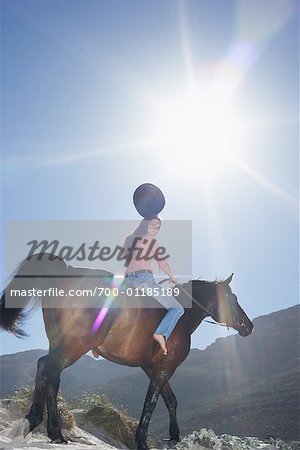 Woman Riding Horse