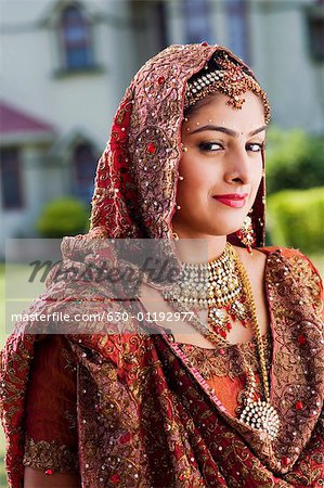 Portrait of a bride in a traditional wedding dress