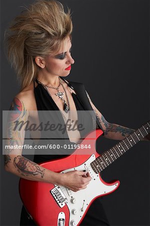 Woman Playing Guitar