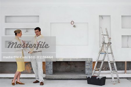 Couple Decorating Home