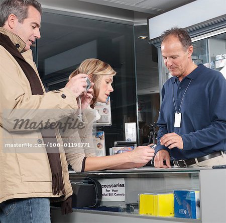Salesman Assisting Customers