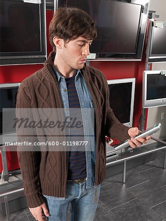 Man Shopping for Television