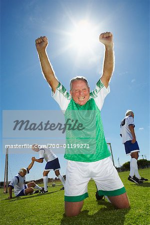 Soccer Player Cheering After Scoring Goal