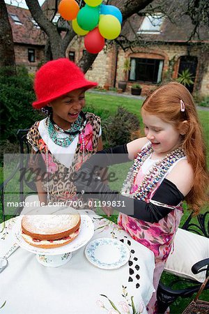 Girls with Cake in Backyard