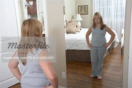Girl Looking in Mirror