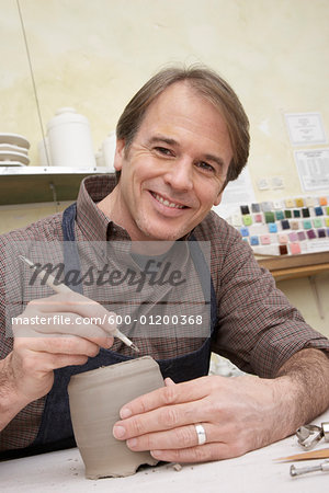 Portrait of Man in Pottery Studio