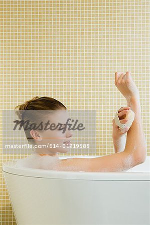 Woman using massage brush