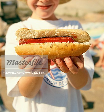 Boy Holding Hotdog