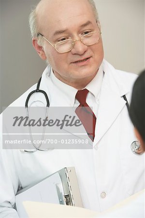 Doctor Speaking to Patient Doctor Speaking to Patient