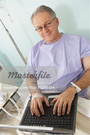 Man in Hospital Bed