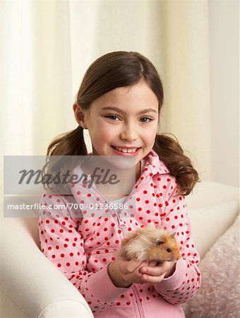 Portrait of Girl with Hamster