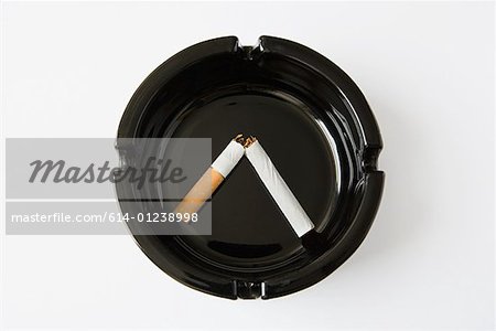 Broken cigarette in ashtray