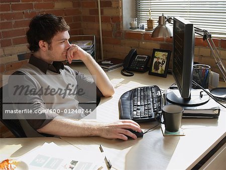 Man Working at Computer