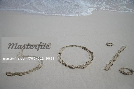 Cinquante pour cent signes dessinés dans le sable