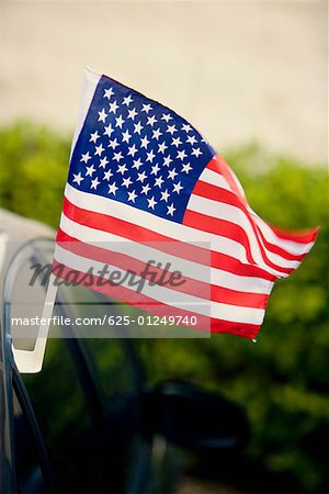 Close-up of an American flag outside of a car, Savannah, Georgia, USA