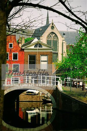Arch bridge across a canal, Leiden, Netherlands