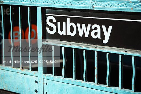 Close-up of a subway sign on an information board