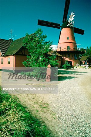 Windmill and a restaurant on a country road, Funen County, Denmark