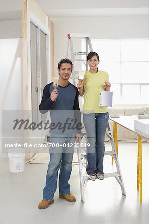 Man and Woman Decorating Home