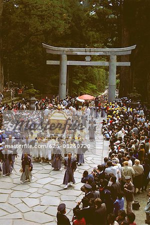 Group of people carrying a Mikoshi in a religious procession Toshu-Gu Shrine, Nikko, Tochigi Prefecture, Japan