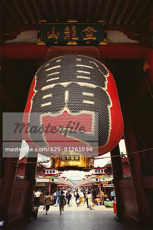 Japanese lantern hanging on the gate at a temple, Kaminarimon Gate, Asakusa Kannon Temple, Asakusa, Tokyo Prefecture, Japan