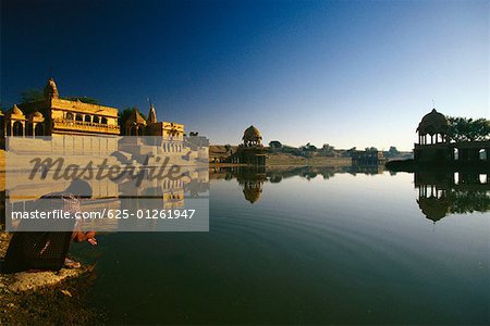 Reflection of a temple in a lake, Gadsisar Lake, Jaisalmer, Rajasthan, India