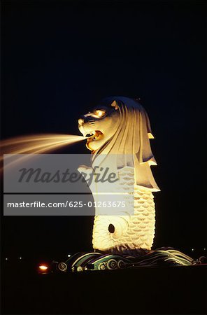 Merlion fountain lit up at night, Merlion Park, Singapore