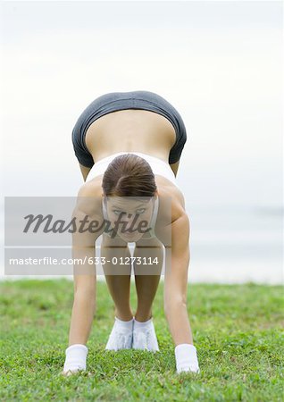 Young woman working out, outdoors