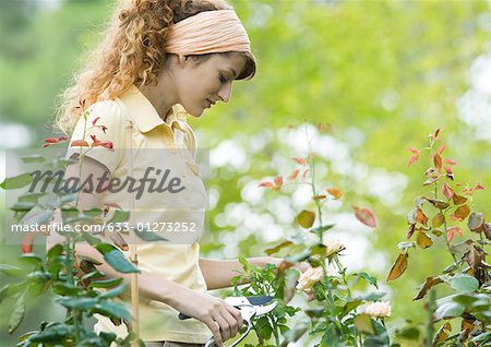 Young woman working in garden