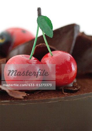 Marzipan cherries on chocolate