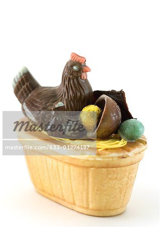 Chocolate chickens and eggs in basket