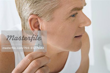 Man Trimming Ear Hair