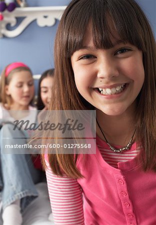 Close-up of Girl with Friends in Background