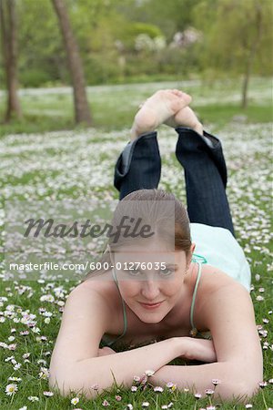 Woman Lying Down on Grass