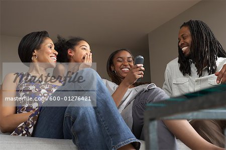 Family on Living Room Sofa